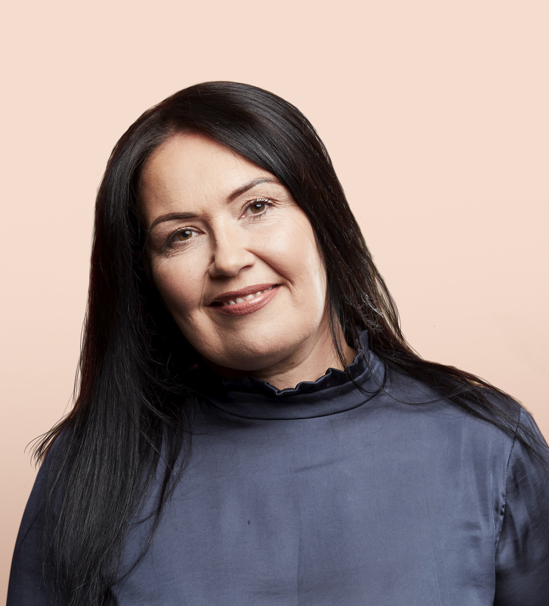 Image of woman smiling at camera
