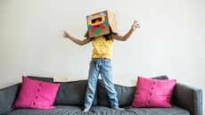 Crafts for kids illustrated by kid with cardboard robot head